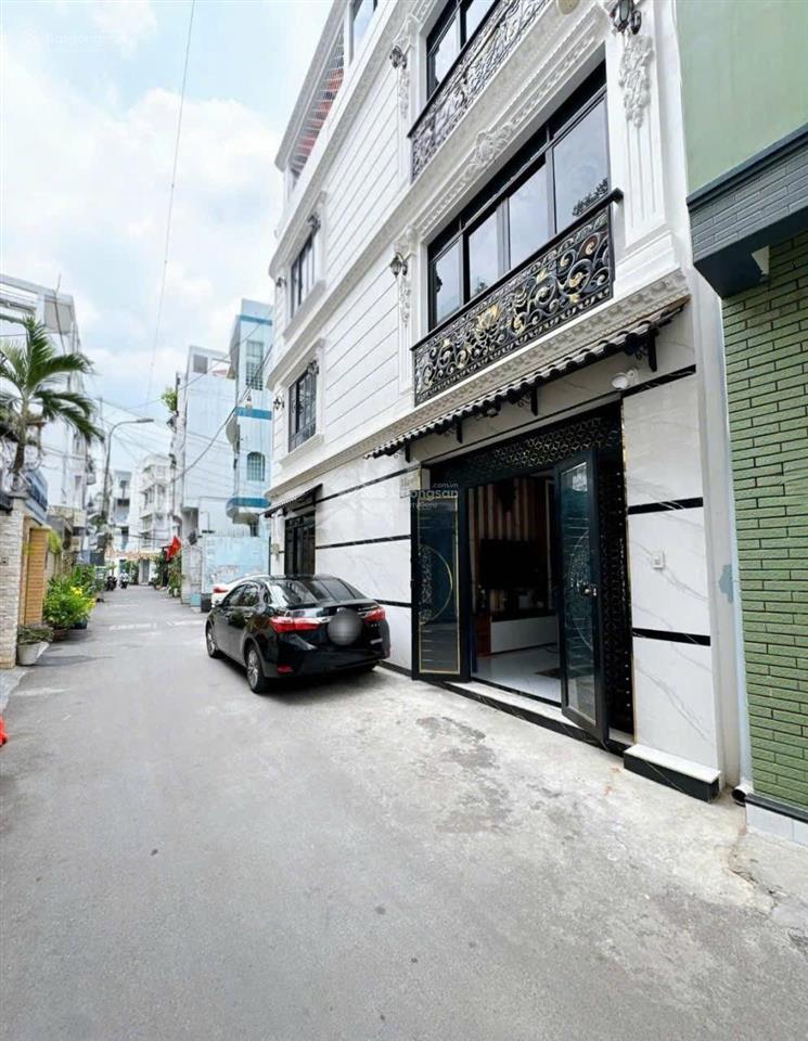 Bán nhà ngay phan đăng lưu p2 phú nhuận dt 12m x 4m cn47m2 kc 4 tầng giá 11,9 tỷ