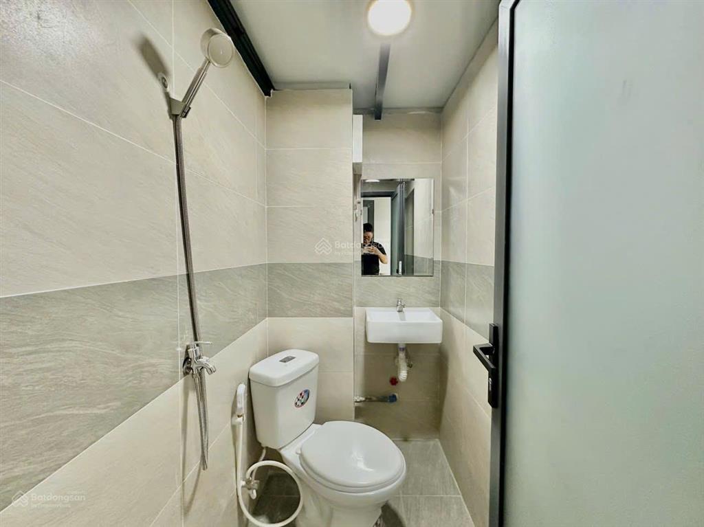Giảm 200 triệu còn 15 tỷ 8 tl  tòa nhà đang kd chdv 16 phòng full hoàn công đủ gần chợ thị nghè