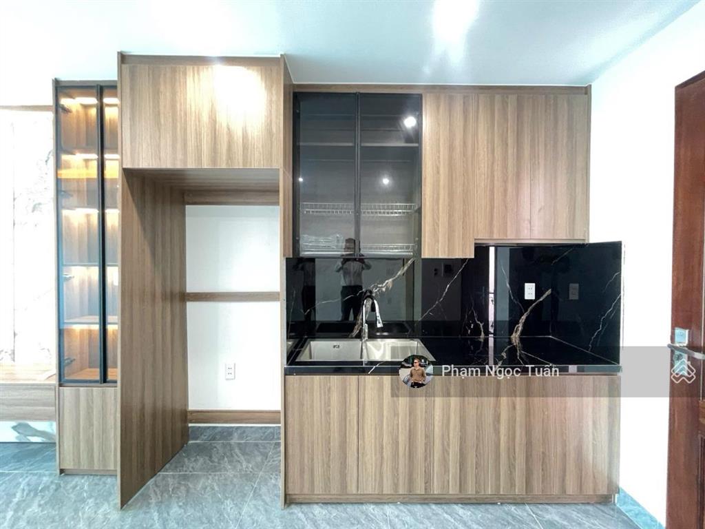 Bán nhà mới xây phố thái hà30m ra mặt phốô tô đỗthang máykinh doanh