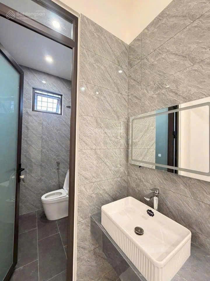 Nhà 1 trệt 1 lầu ngay cây xăng thạnh phú  100m2 thổ cư đúng 1 tỷ690 còn bớt