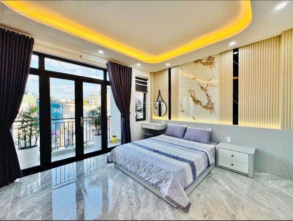 Nàng hoa hậu mới xây đẹp lung linh 4 tầng ngay ngã tư thống nhấtquang trungdt 70m2 giá 8.x tỷ