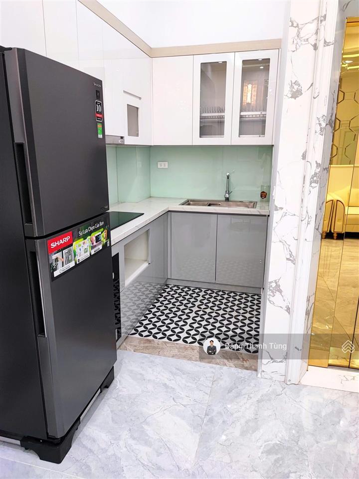 Bán nhà riêng thang máy khu vực đống đa  ô tô 7 chỗ đỗ cửa, 20m ra phố  dt 35m2  mt 5m x 6 tầng
