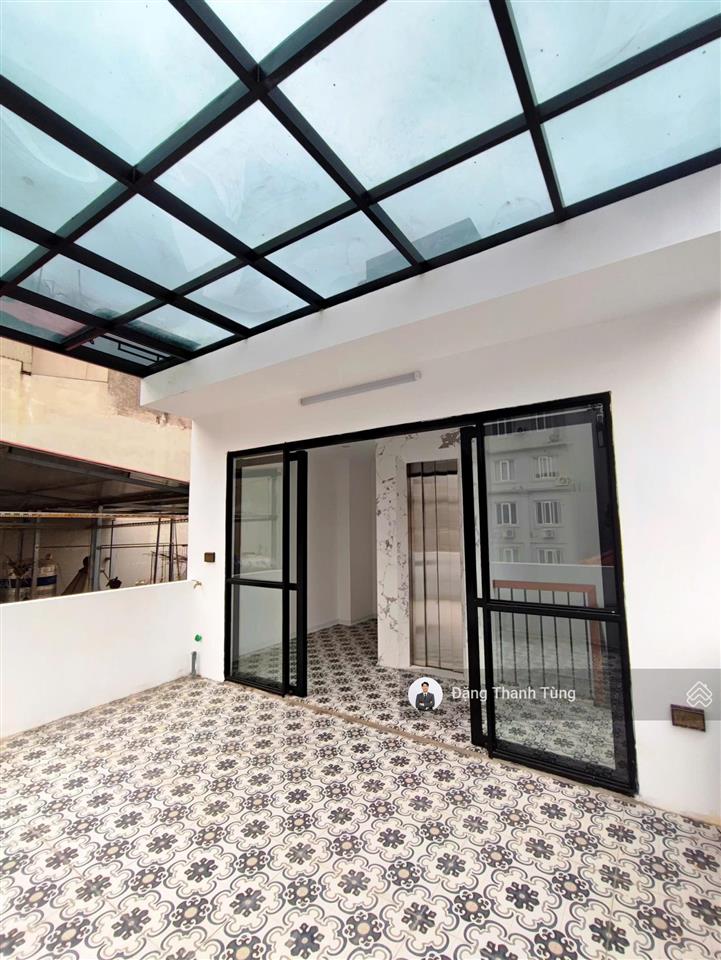 Bán nhà riêng thang máy khu vực đống đa  ô tô 7 chỗ đỗ cửa, 20m ra phố  dt 35m2  mt 5m x 6 tầng