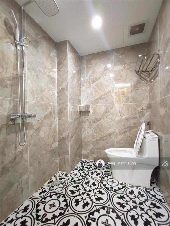 Bán nhà riêng thang máy khu vực đống đa  ô tô 7 chỗ đỗ cửa, 20m ra phố  dt 35m2  mt 5m x 6 tầng