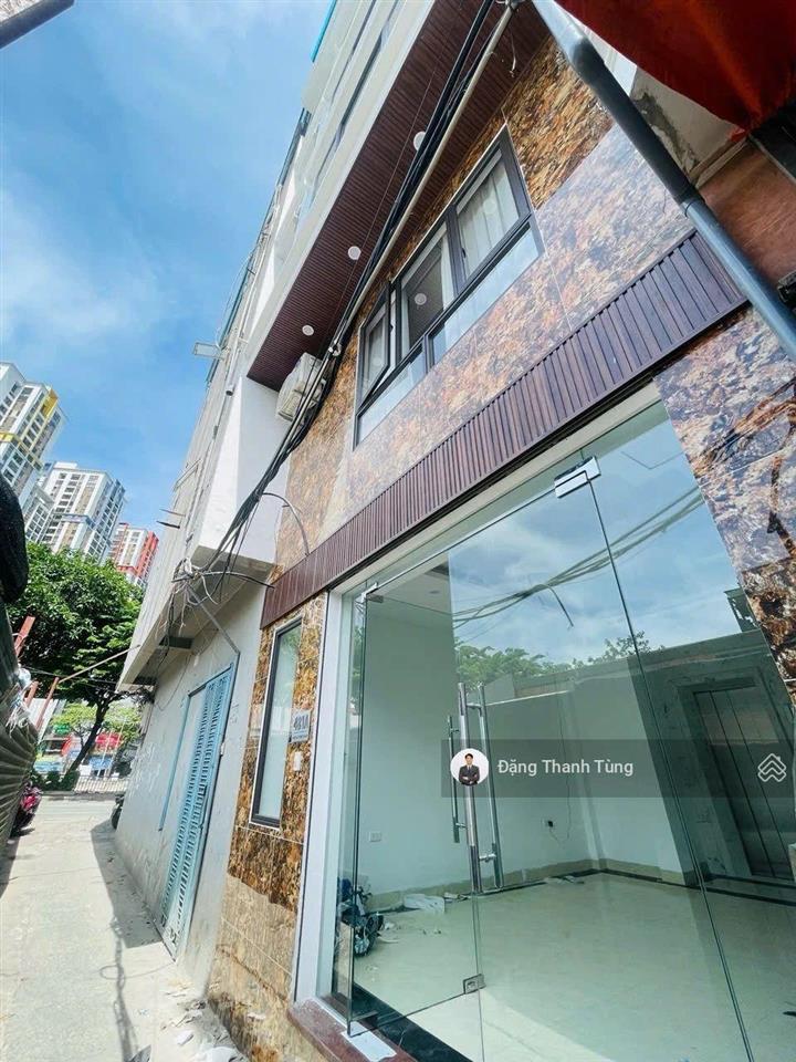 Bán nhà riêng thang máy ngã tư sở  ngõ thông, kinh doanh, 1 nhà ra phố. dt 32m  mt4.55m x 7 tầng.