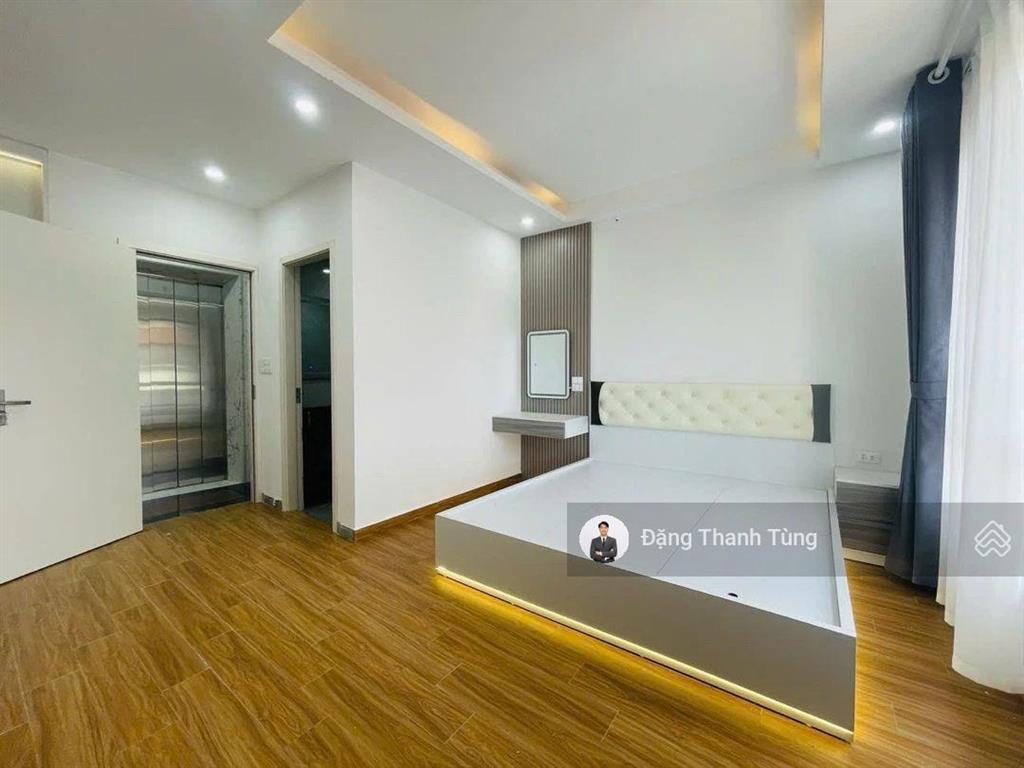 Bán nhà riêng thang máy ngã tư sở  ngõ thông, kinh doanh, 1 nhà ra phố. dt 32m  mt4.55m x 7 tầng.