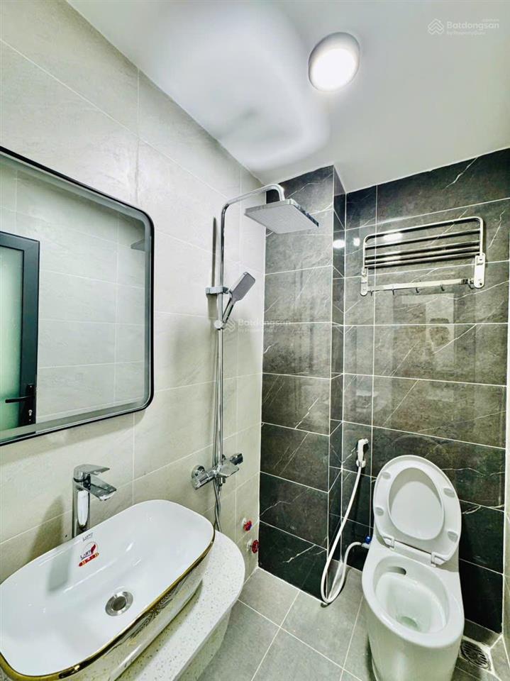 Siêu phẩm! gần mt phan đăng lưu, pn. hđt 70tr, dtcn 50m2, nhà xe + 5 tầng. giá chỉ 13.8 tỷ tl.