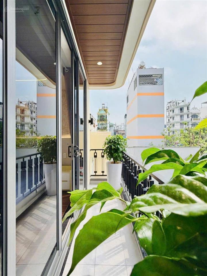 Nhà xây mới 5 tầng full nội thất  ngang rộng gần 5m  hẻm nhựa 5m xe hơi đậu trong nhà  chỉ hơn 7