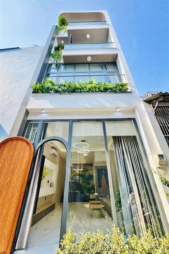 Căn nhà smarthome phong cách sang trọng  4 tầng  full nội thất  hẻm xe hơi  sát mặt tiền đường