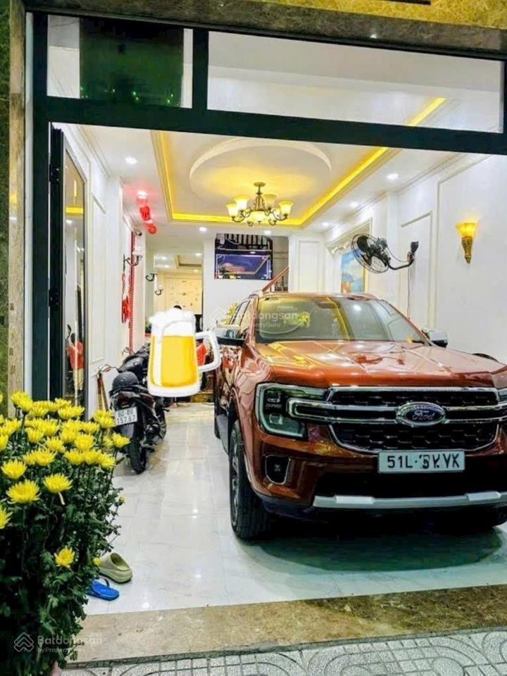 Nhà đẹp 4 tầng  hẻm xe hơi thông 1 trục  gần mặt tiền  dt 4m x 15m  chỉ hơn 7 tỷ.