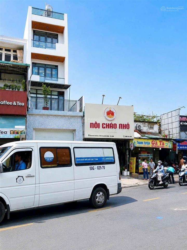 Mặt tiền phạm văn chiêu  kd buôn bán tấp nập  nhà mới 4 tầng  có thang máy  dt 89m2  13,9 tỷ !