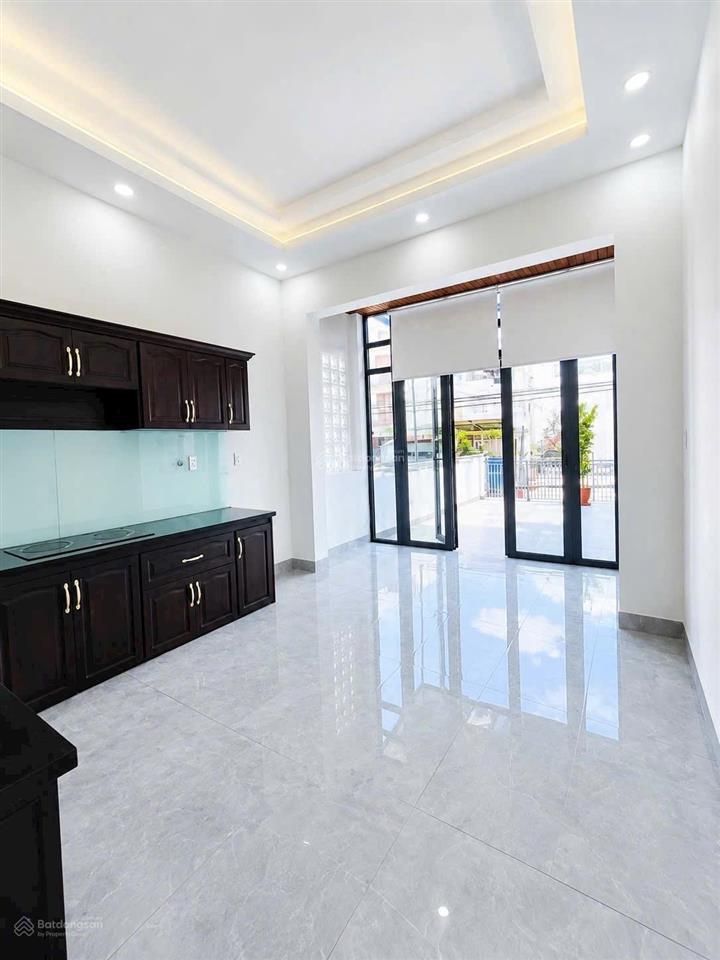 Mặt tiền phạm văn chiêu  kd buôn bán tấp nập  nhà mới 4 tầng  có thang máy  dt 89m2  13,9 tỷ !