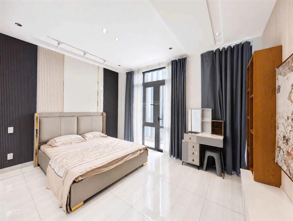 Nhà 5 tầng  hẻm xe hơi thông  dt 4,5m x 15m (67,1m2) full nội thất  gần siêu thị emart giá 8xtỷ