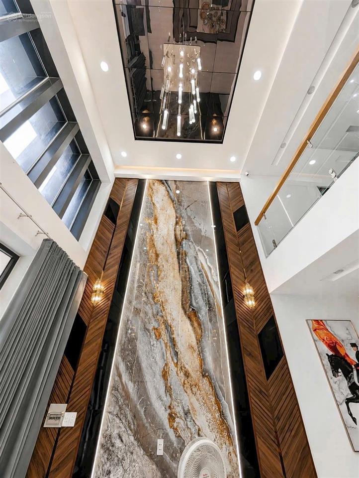 Nhà 5 tầng  hẻm xe hơi thông  dt 4,5m x 15m (67,1m2) full nội thất  gần siêu thị emart giá 8xtỷ