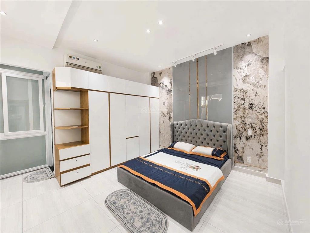 Nhà 5 tầng  hẻm xe hơi thông  dt 4,5m x 15m (67,1m2) full nội thất  gần siêu thị emart giá 8xtỷ