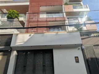 Nhà phố ngang rộng 6m x19m  4 tầng  2 mặt tiền đường 8m thông  đường bờ sông tham lương bến cát