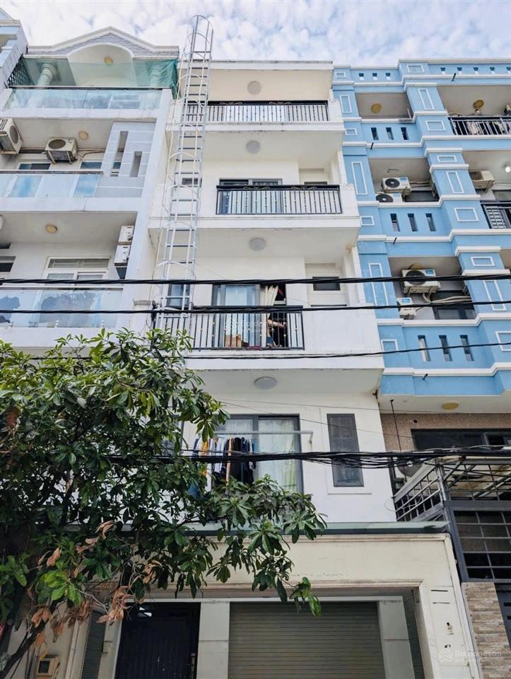 Căn hộ dịch vụ thu nhập 50 triệu/tháng ngay đại học văn lang  hxh 6m thông  5 tầng 15 phòng full