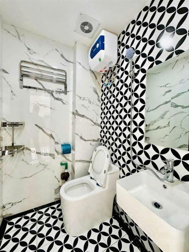 Dòng tiền siêu khủng 1 tỷ/n toà chdv hào nam 65m2*7t*12pkk, 50m ra phố, thang máy, pccc/gpxd