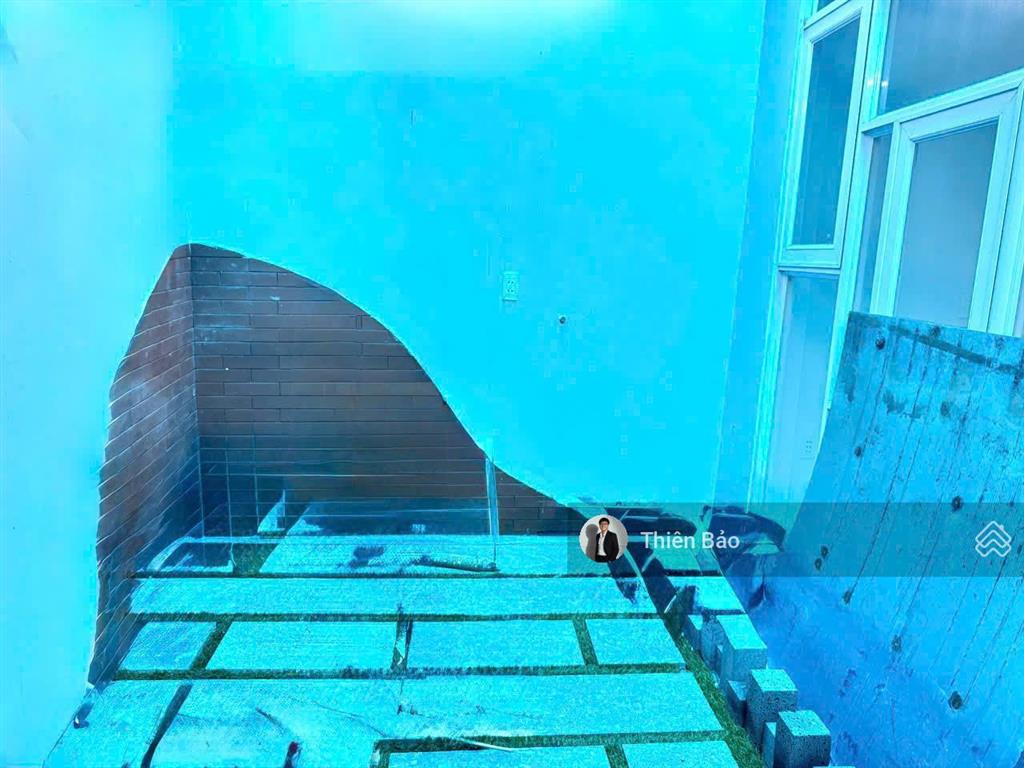 Bán nhà 525/quang trung (4x16m) 4 tầng lầu 4 phòng ngủ + đường nhựa 8m  xe hơi chạy song song