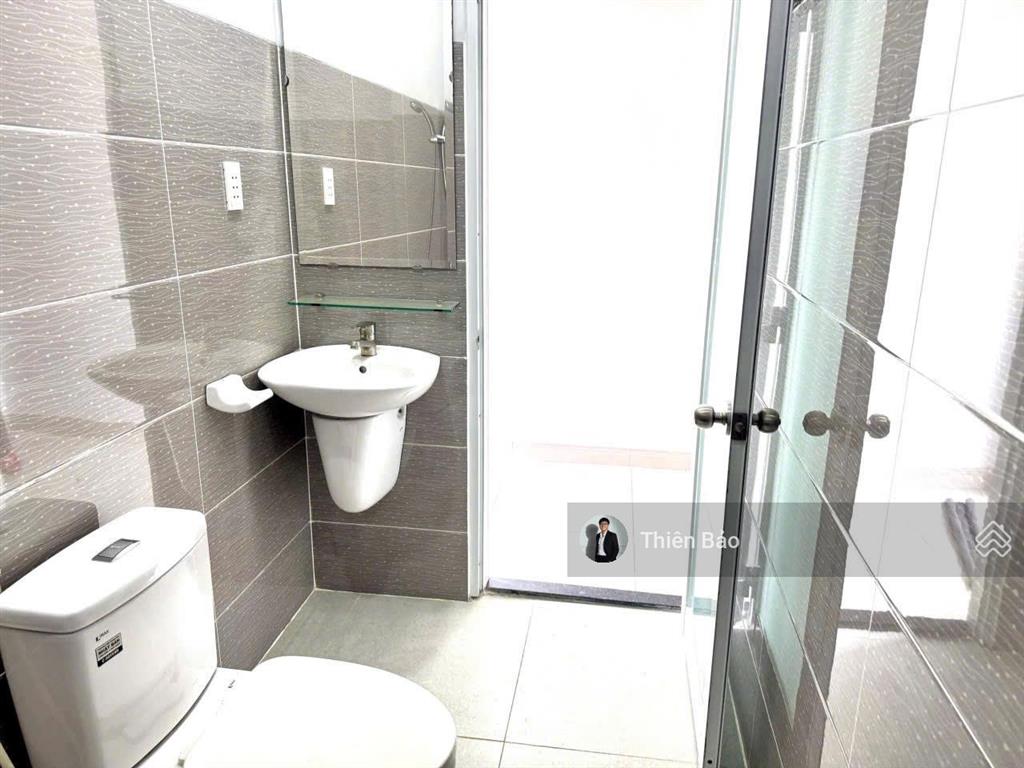 Bán nhà 525/quang trung (4x16m) 4 tầng lầu 4 phòng ngủ + đường nhựa 8m  xe hơi chạy song song