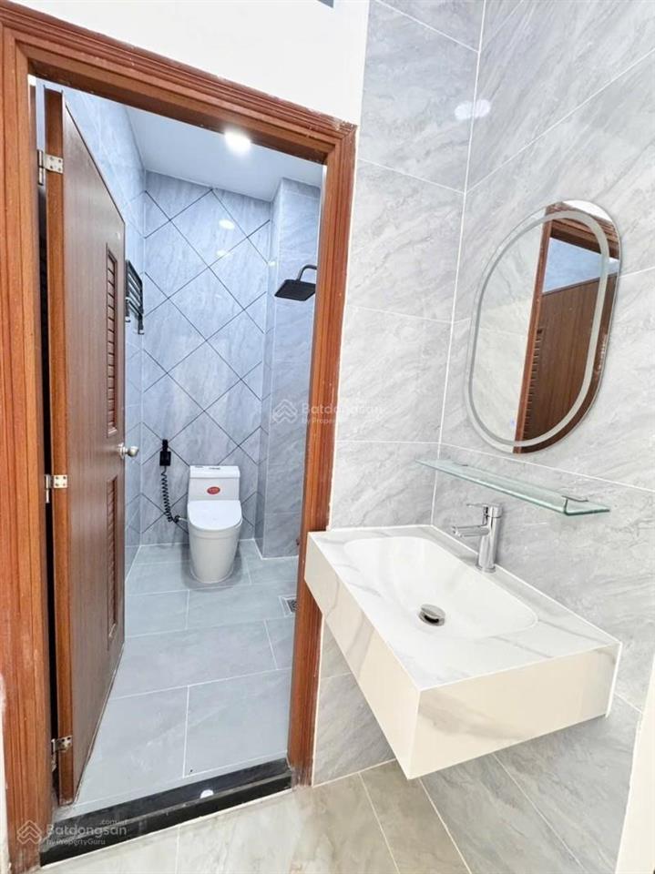 Nhà mới đẹp 4 tầng 4pn hẻm xe hơi 6m gần hương lộ 2. 6,5 tỷ