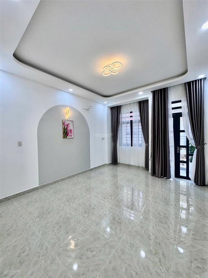 Nhà mới đẹp 4 tầng 4pn hẻm xe hơi 6m gần hương lộ 2. 6,5 tỷ