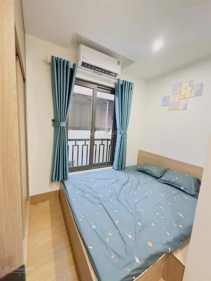 Hot! tòa chdv 65m2*5t p trung kính,ô tô 30m,ngõ thông,2 thoáng,sổ vuông,pccc,dòng tiền 50tr/tháng