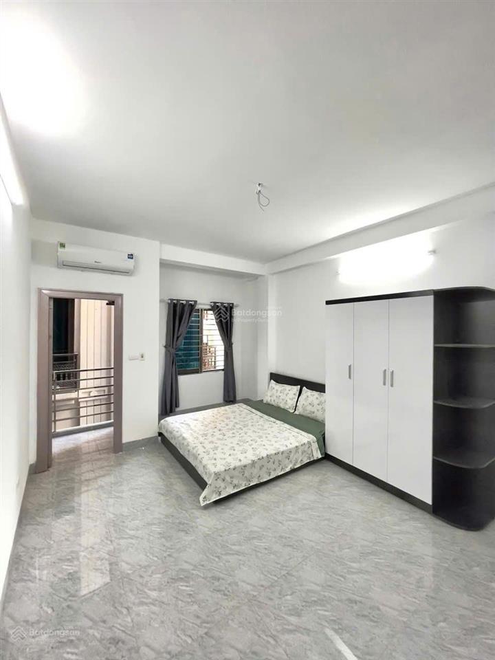 Gấp! toà dòng tiền tôn thất tùng 60m2*8t*16pkk, sát phố, ô tô 30m, ngõ thông, 2 thoáng, sổ vuông.