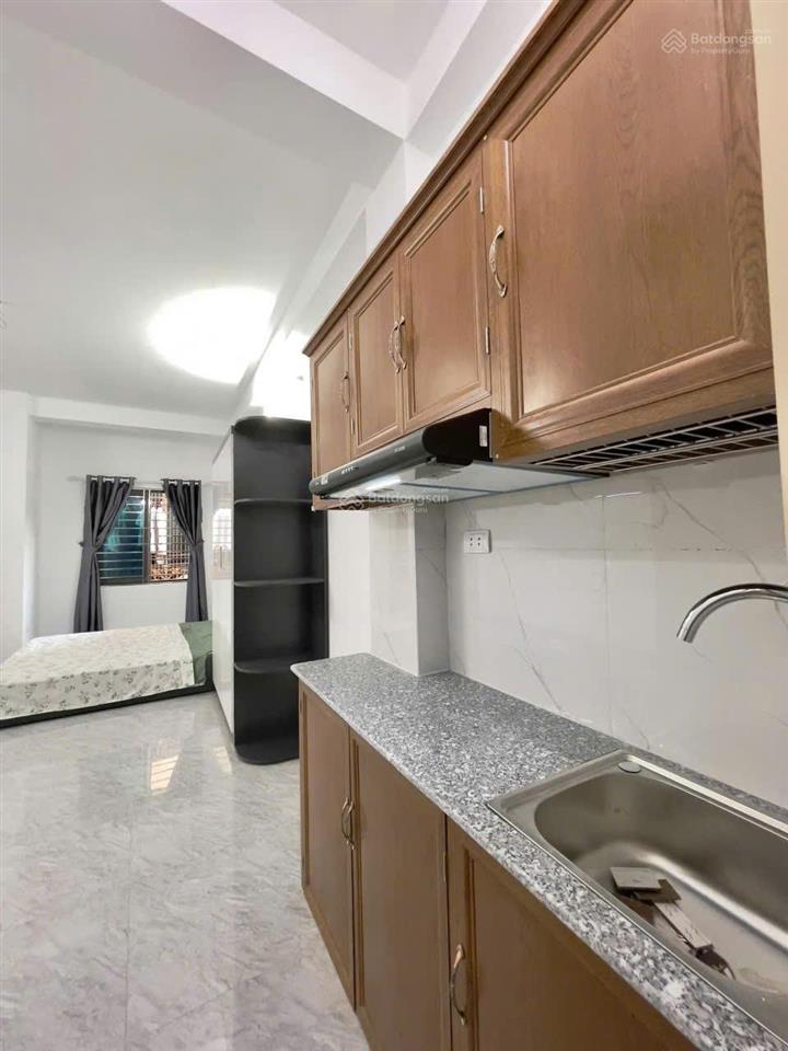 Gấp! toà dòng tiền tôn thất tùng 60m2*8t*16pkk, sát phố, ô tô 30m, ngõ thông, 2 thoáng, sổ vuông.