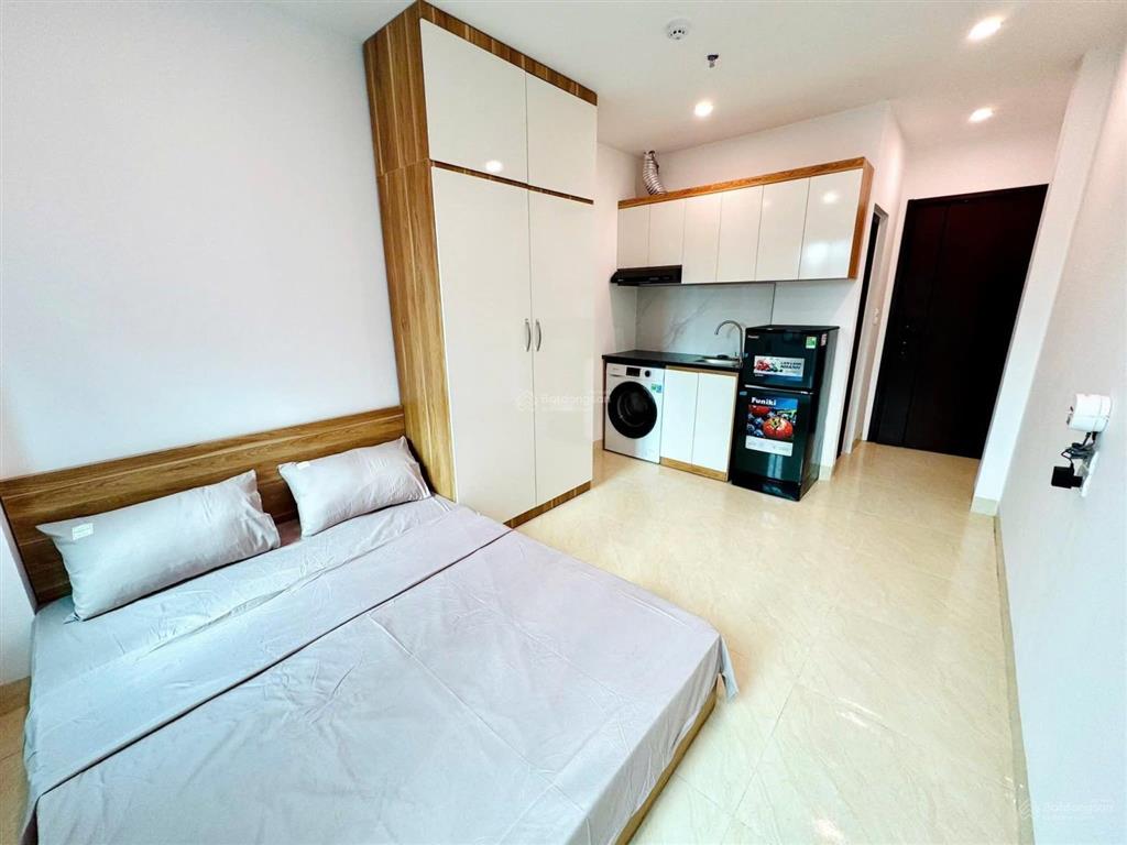 Giá tốt! toà chdv hào nam 60m2*7t*12pkk, sát phố, 2p ga cát linh, ngõ thông , tm, pccc, sổ vuông.
