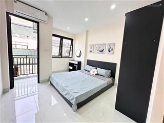 Sốc! toà chdv 60m2*7t*12pkk hoàng cầu, sát phố, 2 thoáng, ba gác, xây mới, tm, pccc, sổ vuông.