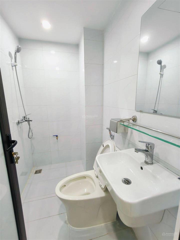 Sốc! toà chdv 60m2*7t*12pkk hoàng cầu, sát phố, 2 thoáng, ba gác, xây mới, tm, pccc, sổ vuông.