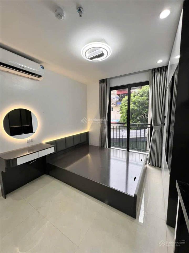 Giá siêu tốt! toà chdv ngay cạnh đh thương mại 97m2*8t, ô tô đỗ cửa, 2 thoáng, sẵn sổ, dt 85tr/th