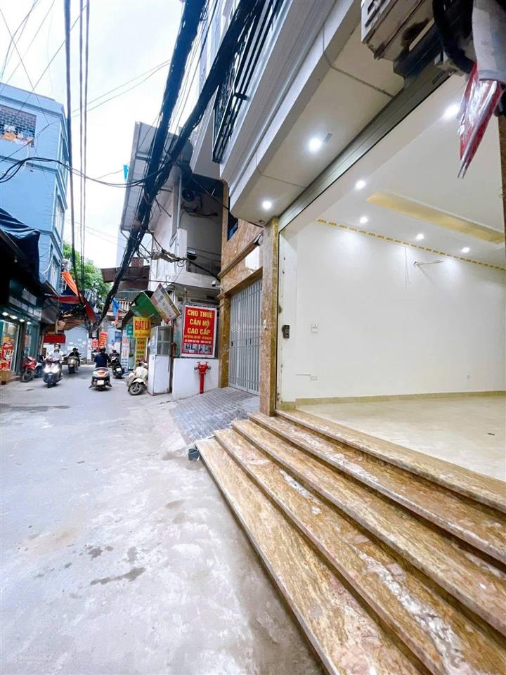 Giá siêu tốt! toà chdv ngay cạnh đh thương mại 97m2*8t, ô tô đỗ cửa, 2 thoáng, sẵn sổ, dt 85tr/th