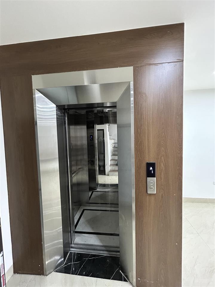 Bán gấp nhà phố lê văn lương dt 50m x 6 tầng thang máy đẹp keng ô tô đỗ cửa
