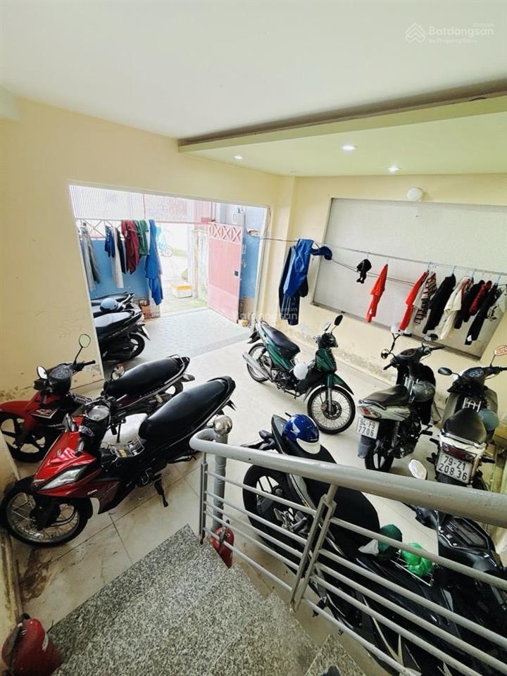 Hơn 7 tỷ  4 tầng 60m2  hẻm xe hơi  dòng tiền 30tr/tháng  gần phạm văn đồng