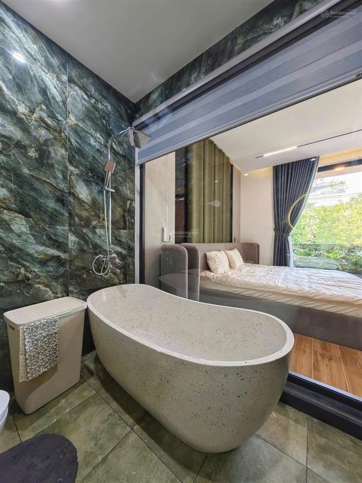 Nhà 3 tầng mặt tiền đường 7,5m lề 4m, cách biển 300m. 125m2, full nội thất cao cấp, sẵn sổ