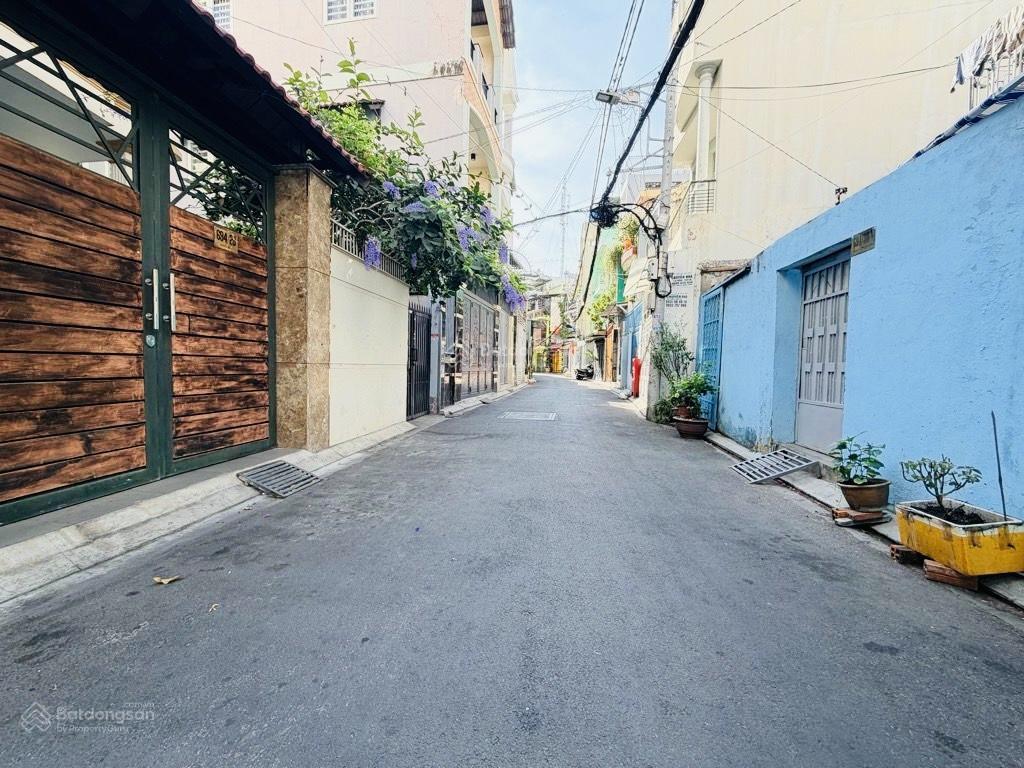 Trung tâm phú nhuận  hẻm ô tô  2 tầng đúc (4pn)  76m2  ngay cv gia định, hồ văn huê