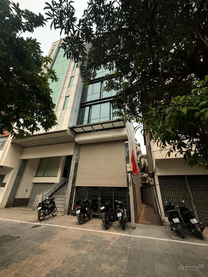 ( 39 tỷ 46 m2 )tòa nhà văn phòng mặt phố vỉa hè tây sơn lô góc 3 thoáng 8 tầng thang máy