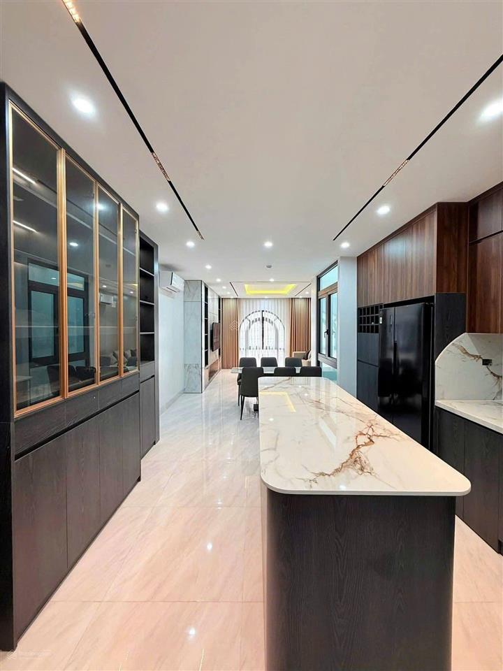 22,5 tỷ tt đống đa 80m2*7 tầng*mt 5,5m 3 ô tô tránh thông sàn nhà đẹp kinh doanh dt 1,5 tỷ/năm