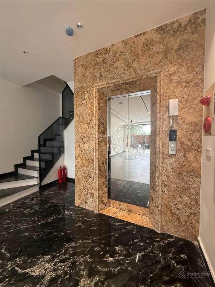 40,5 tỷ phố hào nam 65m2*7 tầng*5m mt 5m vỉa hè kinh doanh mặt phố, ô tô dừng đỗ thoải mái