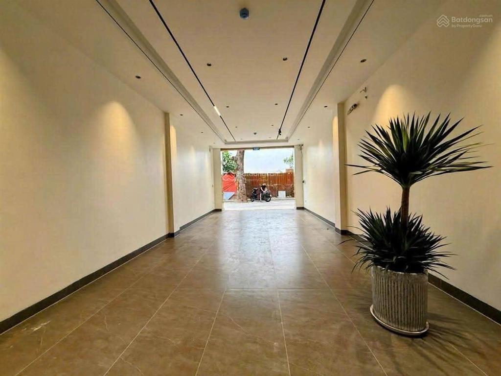 40,5 tỷ phố hào nam 65m2*7 tầng*5m mt 5m vỉa hè kinh doanh mặt phố, ô tô dừng đỗ thoải mái