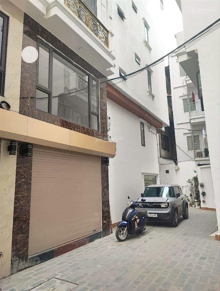 Nhà đẹp đống đa, gara oto  thang máy  20m ra phố oto tránh  nói không với quy hoạch.