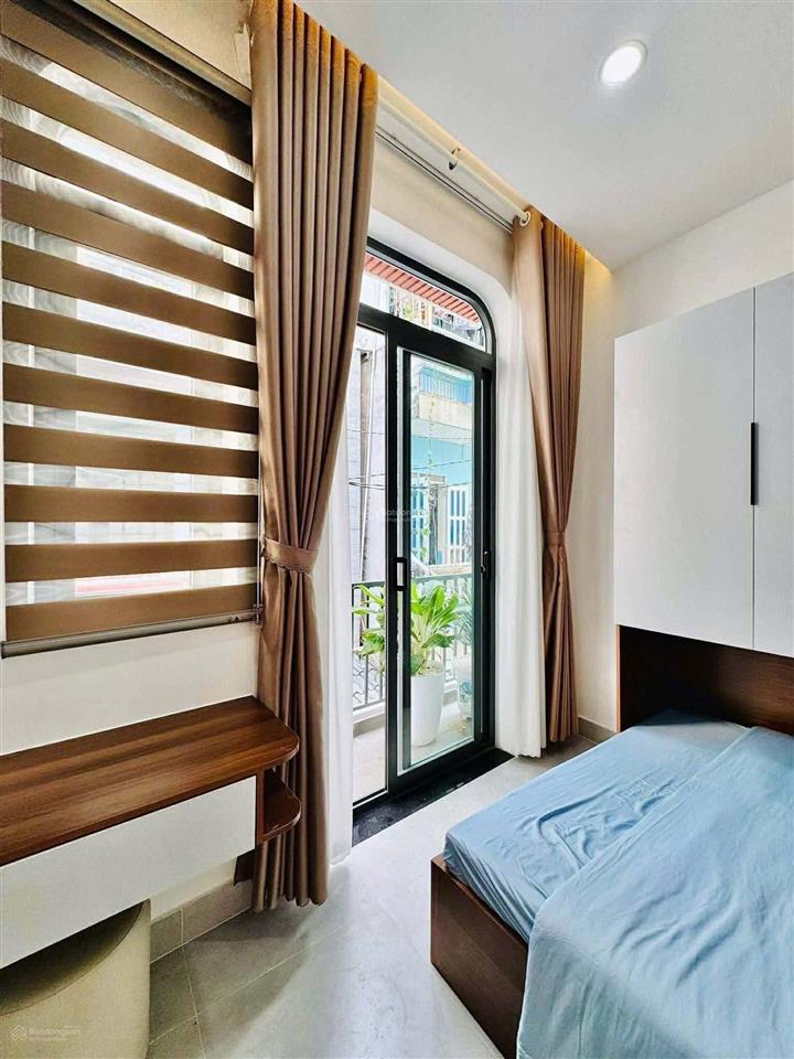 Bán nhà giá ngộp 2,98 tỷ/70m2  nguyễn cửu vân  ô tô trong nhà , đang cho thuê 19tr, sổ riêng