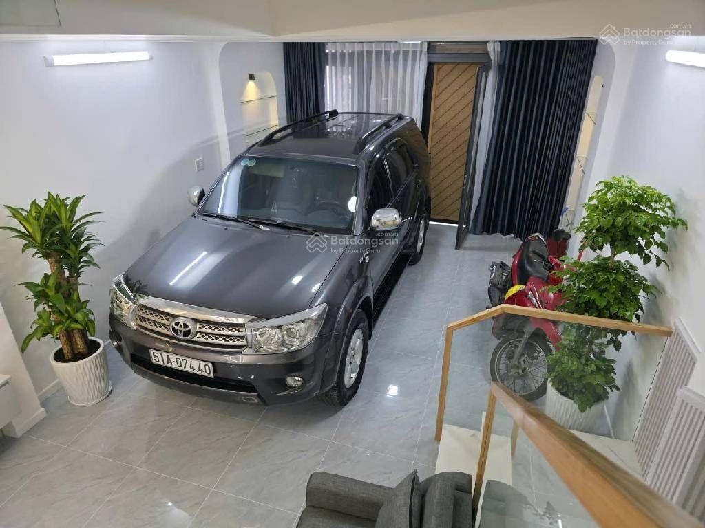 4 tầng nở hậu xe hơi ngủ trong nhà q7