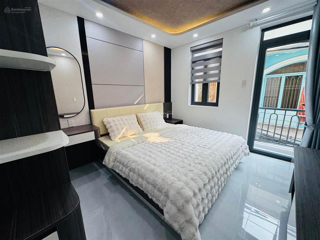 Nhà mới 3 lầu (dt 4.5 x 7)  3pn  hẻm 3.5m phan huy ích gò vấp  giá 3.18 tỷ