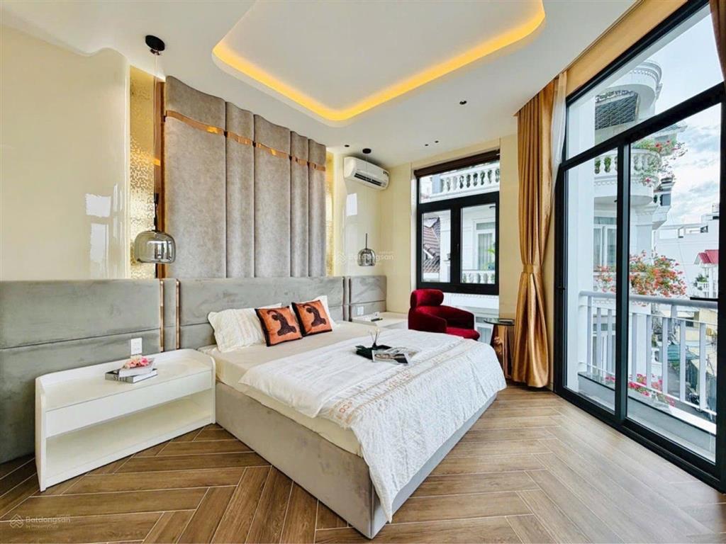 Bán nhà phan van tri canh emart 2 mat thoang oto đô nhà 6 tầng thang may chỉ nhỉnh 12ty.tl