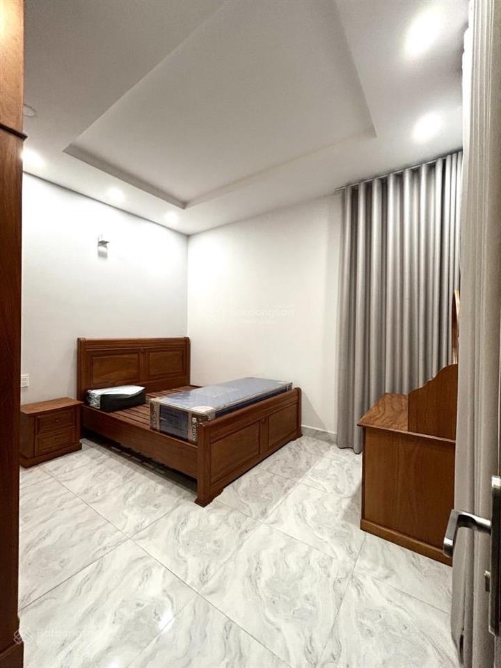 Hoàng trọng mậu q7, 4 tầng 5pn full nội thất xịn, xe hơi ngủ trong nhà, dt 4.2x15m.