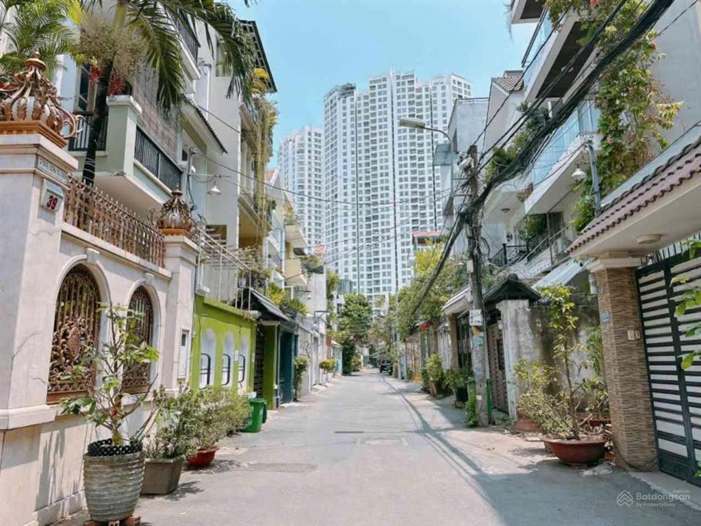 Bán nhà hẻm 6m khu biệt thự kiều đàm quận 7  dt 5x18m, 4 tầng, ô tô ngủ trong nhà, giá chỉ 12,8 tỷ