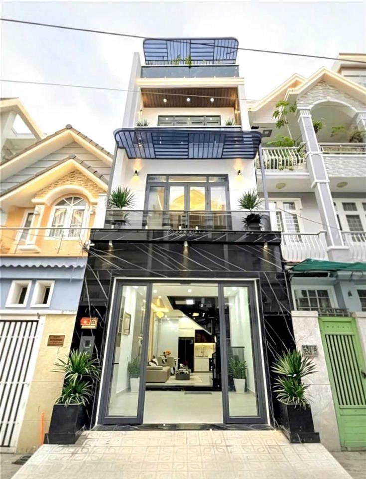 Bán nhà mặt tiền hẻm thông, xe hơi tránh nhau, kinh doanh buôn bán ok, có gara trong nhà